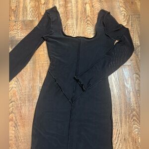 beautiful mesh detailed black calf level dress 
mesh sleeves